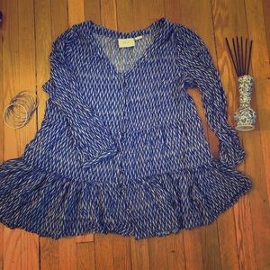 Blue and white covered button closure blouse